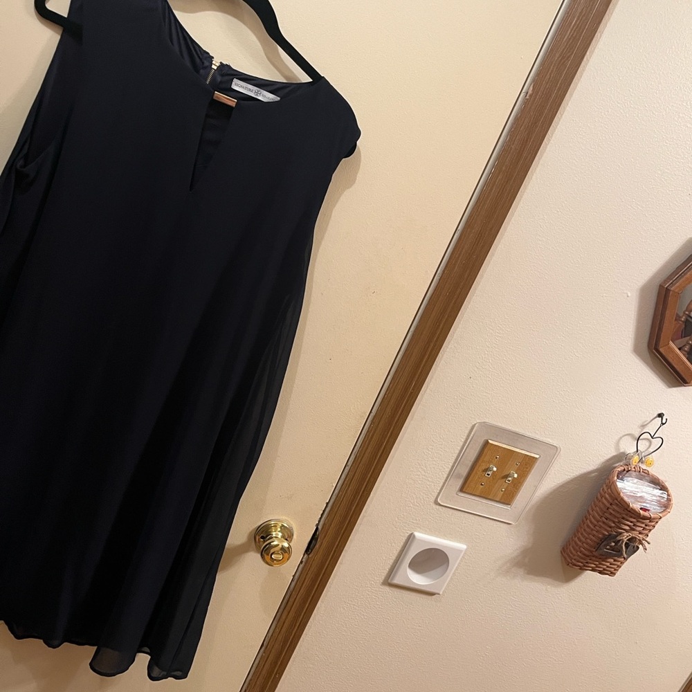 Elegant Navy Blue Sleeveless Dress. Has a sheer overlay. Brand New NEVER WORN